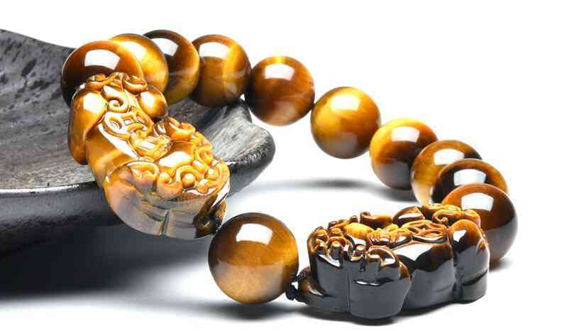 黑猫眼石的功效与作用(黑猫眼石的功效与作用及禁忌)