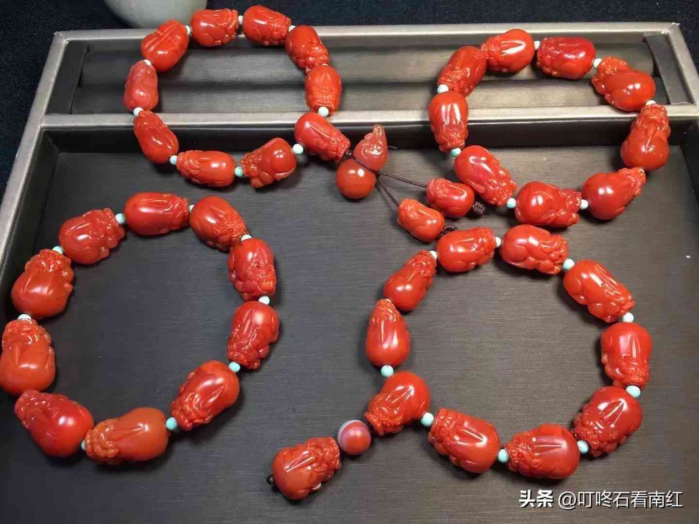 手链2个貔貅中间一个球(手链2个貔貅中间一个球图片)