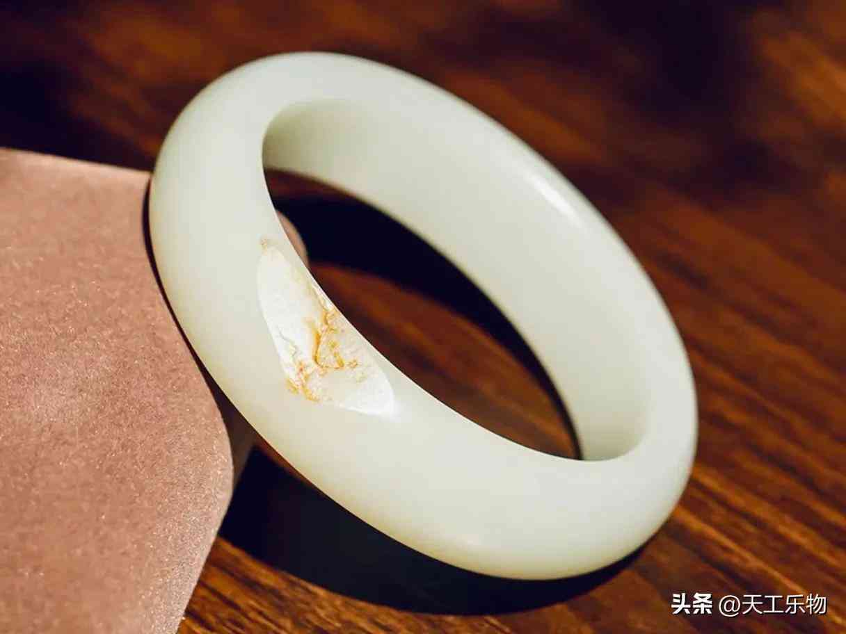 真正的和田玉手镯(真正的和田玉手镯多少钱一副)