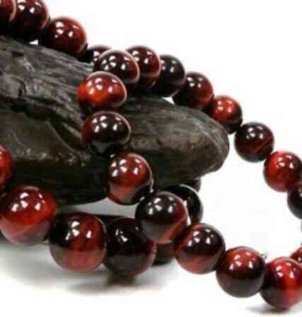 金虎眼石的功效与作用(金虎眼石的功效与作用佩戴禁忌)