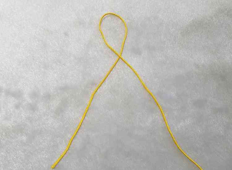 佛头三通收尾打结方法(三通手串穿绳方法图解)插图2